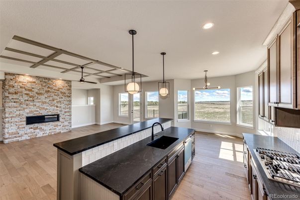 Fireplace, Interior, Kitchen, Pendant Lights, Recessed Lighting, Stone Walls, Wood Texture Flooring