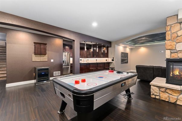Billiard Table, Fireplace, Game Room, Interior, Kitchen, Recessed Lighting, Wood Texture Flooring