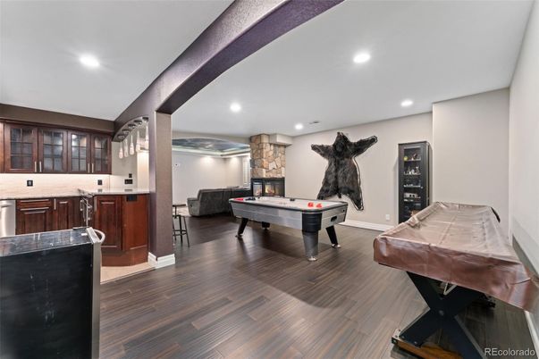 Billiard Table, Fireplace, Game Room, Interior, Recessed Lighting, Wood Texture Flooring