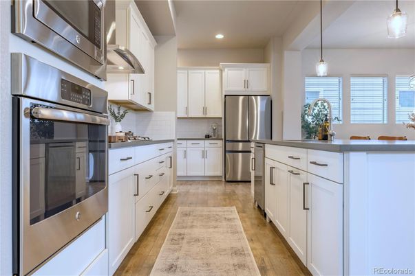 Interior, Kitchen, Pendant Lights, Recessed Lighting, Stainless Steel Appliances, Wood Texture Flooring