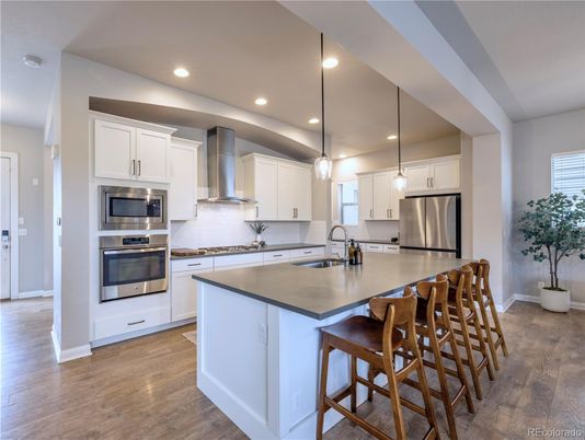 Interior, Kitchen, Pendant Lights, Recessed Lighting, Stainless Steel Appliances, Wood Texture Flooring