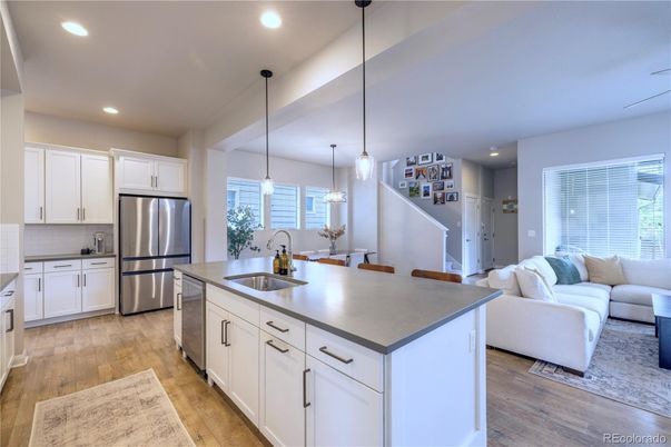 Dining room, Interior, Kitchen, Living room, Pendant Lights, Recessed Lighting, Stainless Steel Appliances, Wood Texture Flooring