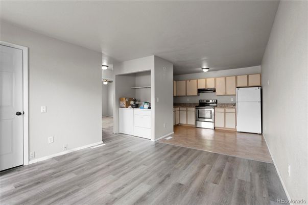 Empty room, Interior, Kitchen, Stainless Steel Appliances, Wood Texture Flooring