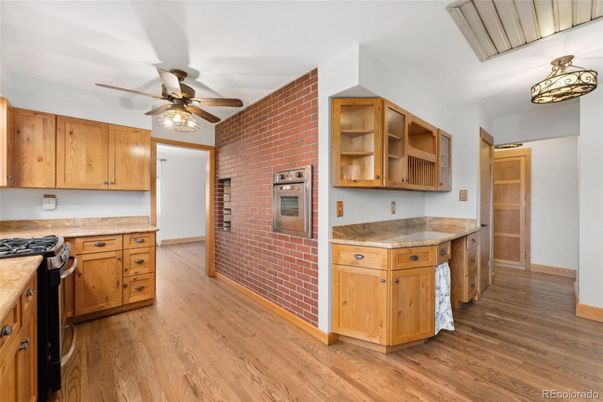 Interior, Kitchen, Stainless Steel Appliances, Stone Walls, Wood Texture Flooring