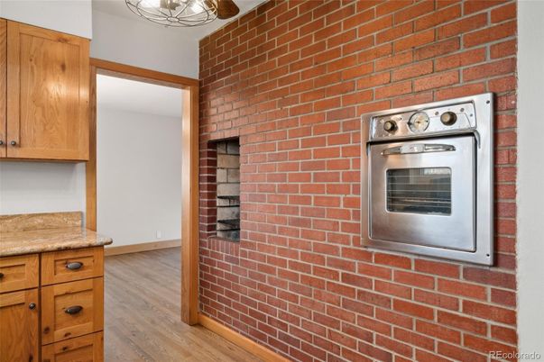 Interior, Kitchen, Stainless Steel Appliances, Stone Walls, Wood Texture Flooring