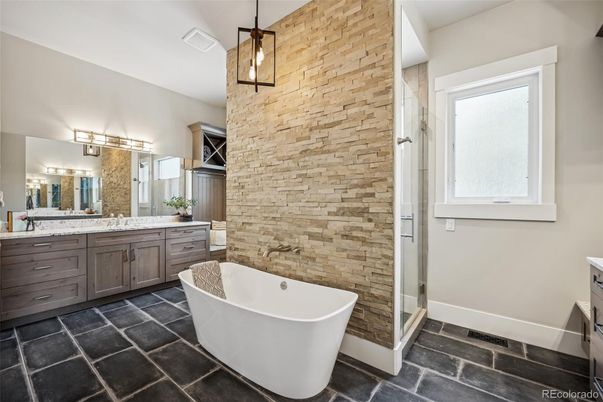 Bathroom, Dual Sink Vanities, Free Standing Baths, Interior, Pendant Lights, Stone Walls