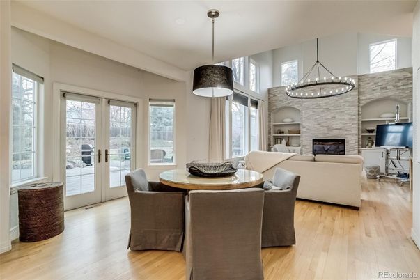 Dining room, Fireplace, Interior, Living room, Pendant Lights, Stone Walls, Wood Texture Flooring