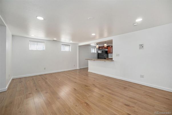 Empty room, Interior, Kitchen, Pendant Lights, Recessed Lighting, Wood Texture Flooring