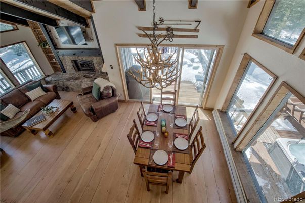 Chandelier, Dining room, Fireplace, Interior, Living room, Wooden Beams, Wood Texture Flooring