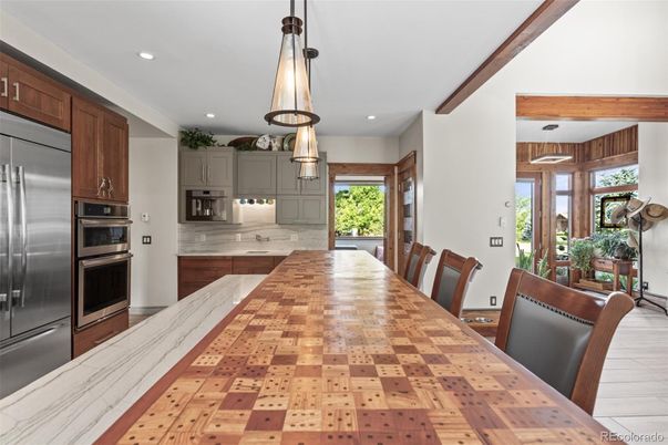 Dining room, Interior, Kitchen, Pendant Lights, Recessed Lighting, Stainless Steel Appliances, Wood Texture Flooring