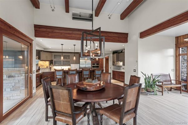 Dining room, Interior, Kitchen, Pendant Lights, Recessed Lighting, Stainless Steel Appliances, Wooden Beams, Wood Texture Flooring