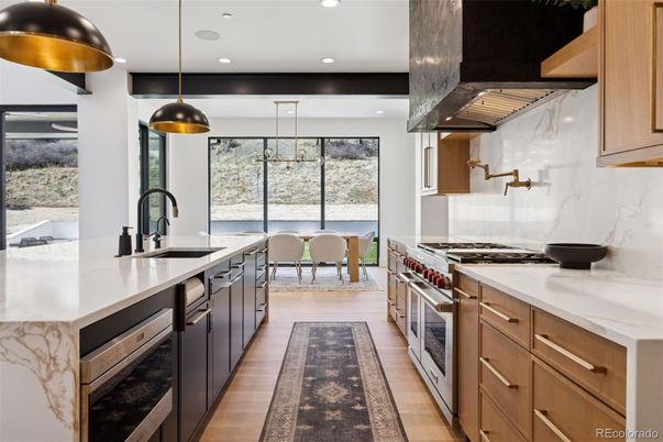 Dining room, Interior, Kitchen, Pendant Lights, Recessed Lighting, Stainless Steel Appliances, Wood Texture Flooring