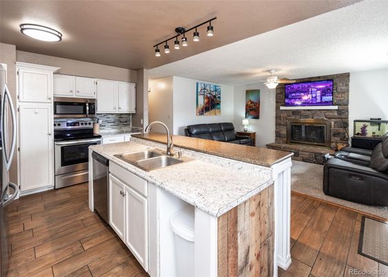 Fireplace, Interior, Kitchen, Living room, Stainless Steel Appliances, Wood Texture Flooring