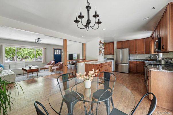 Chandelier, Dining room, Interior, Kitchen, Living room, Recessed Lighting, Stainless Steel Appliances, Wood Texture Flooring
