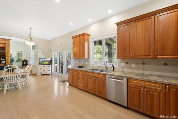 Dining room, Interior, Kitchen, Pendant Lights, Recessed Lighting, Stainless Steel Appliances, Wood Texture Flooring