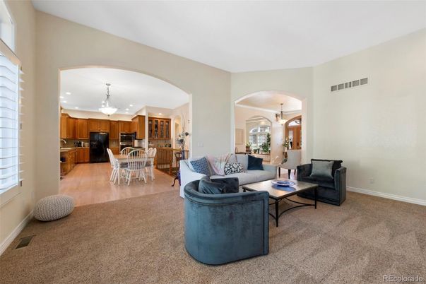 Chandelier, Dining room, Interior, Kitchen, Living room, Recessed Lighting, Stainless Steel Appliances, Wood Texture Flooring