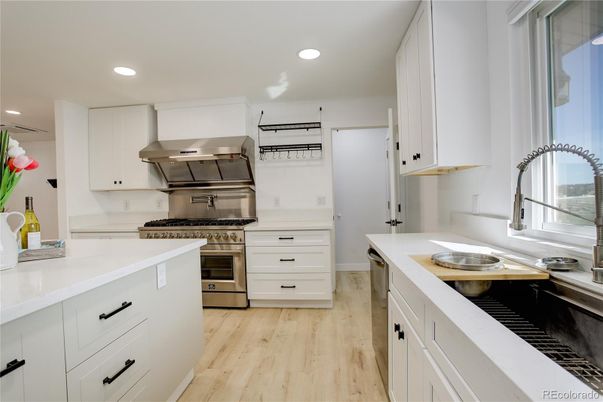 Interior, Kitchen, Recessed Lighting, Stainless Steel Appliances, Wood Texture Flooring