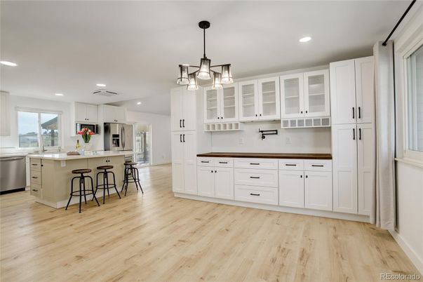 Interior, Kitchen, Pendant Lights, Recessed Lighting, Stainless Steel Appliances, Wood Texture Flooring