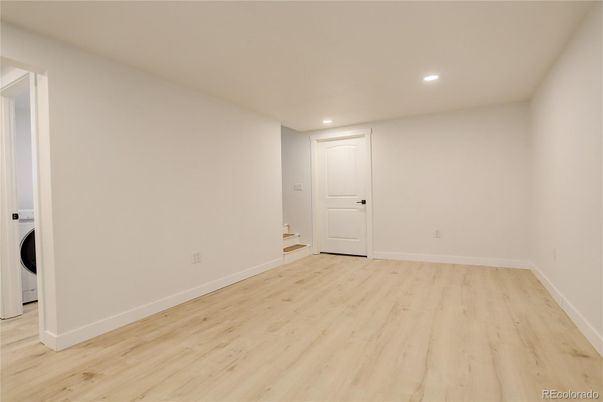 Empty room, Interior, Recessed Lighting, Washer, Wood Texture Flooring