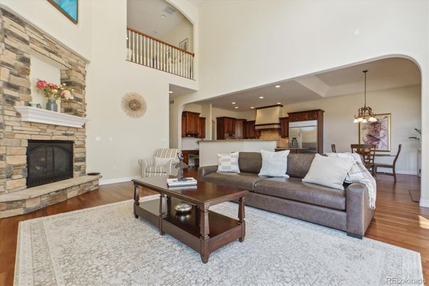 Dining room, Fireplace, Interior, Kitchen, Living room, Pendant Lights, Recessed Lighting, Stainless Steel Appliances, Wood Texture Flooring