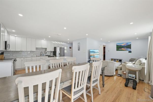 Dining room, Interior, Kitchen, Living room, Pendant Lights, Recessed Lighting, Stainless Steel Appliances, Wood Texture Flooring