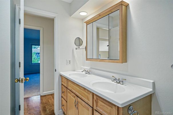 Bathroom, Dual Sink Vanities, Interior, Recessed Lighting, Wood Texture Flooring