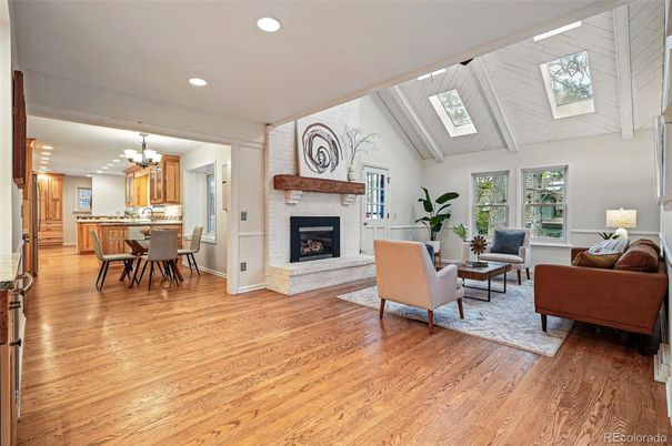 Chandelier, Dining room, Fireplace, Interior, Kitchen, Living room, Pendant Lights, Recessed Lighting, Wood Texture Flooring