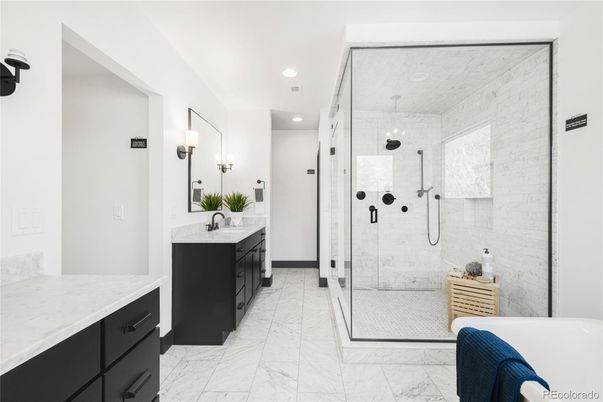 Bathroom, Dual Sink Vanities, Glass Shower, Interior, Marble, Marble Walls, Recessed Lighting
