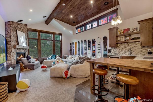 Fireplace, Interior, Living room, Pendant Lights, Recessed Lighting, Stone Walls, Wooden Beams
