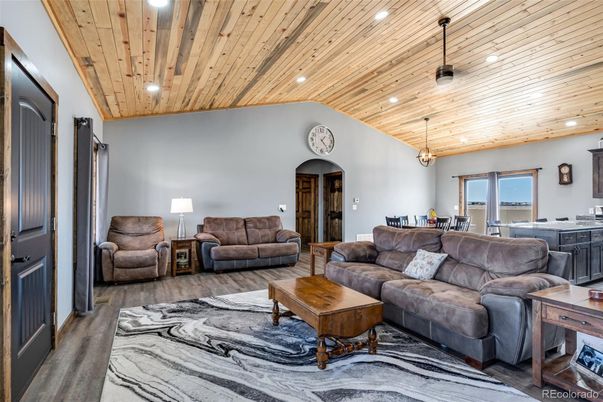 Dining room, Interior, Living room, Pendant Lights, Recessed Lighting, Wooden Ceilings, Wood Texture Flooring