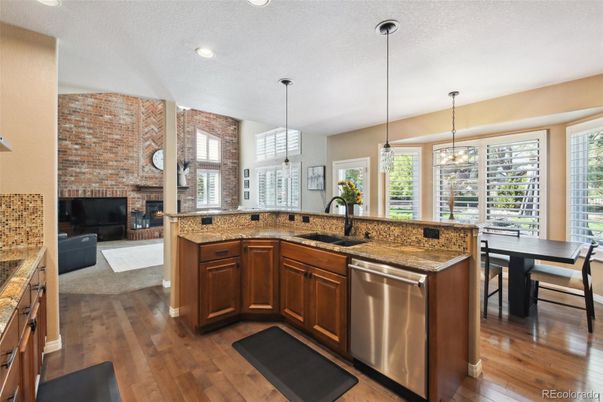 Dining room, Fireplace, Interior, Kitchen, Pendant Lights, Recessed Lighting, Stone Walls, Wood Texture Flooring