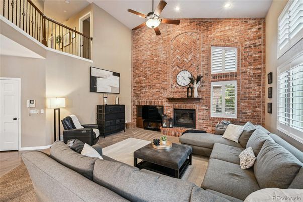 Fireplace, Interior, Living room, Recessed Lighting, Stone Walls, Wood Texture Flooring