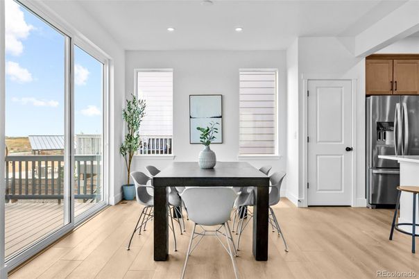 Dining room, Interior, Kitchen, Recessed Lighting, Stainless Steel Appliances, Wood Texture Flooring