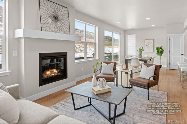 Dining room, Fireplace, Interior, Living room, Recessed Lighting, Wood Texture Flooring