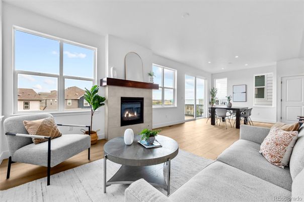 Dining room, Fireplace, Interior, Living room, Recessed Lighting, Wood Texture Flooring