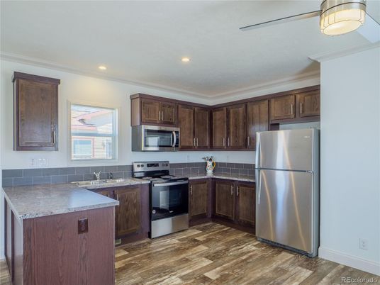 Interior, Kitchen, Recessed Lighting, Stainless Steel Appliances, Wood Texture Flooring