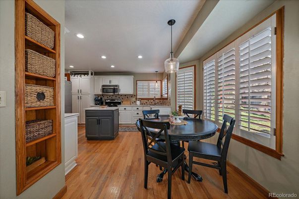 Dining room, Interior, Kitchen, Pendant Lights, Recessed Lighting, Stainless Steel Appliances, Wood Texture Flooring
