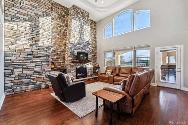 Fireplace, Interior, Living room, Recessed Lighting, Stone Walls, Wood Texture Flooring