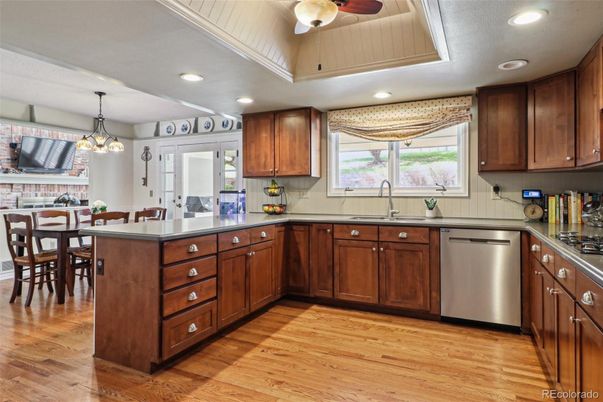 Dining room, Interior, Kitchen, Pendant Lights, Recessed Lighting, Stainless Steel Appliances, Wood Texture Flooring
