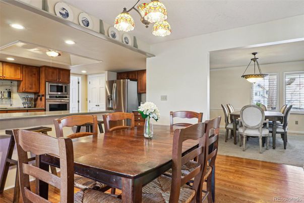 Dining room, Interior, Kitchen, Pendant Lights, Recessed Lighting, Stainless Steel Appliances, Wood Texture Flooring