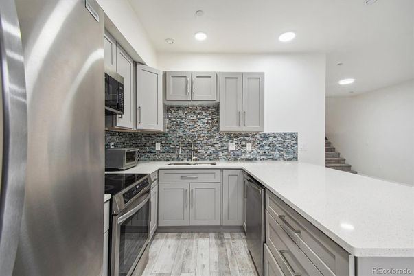 Interior, Kitchen, Recessed Lighting, Stainless Steel Appliances, Wood Texture Flooring