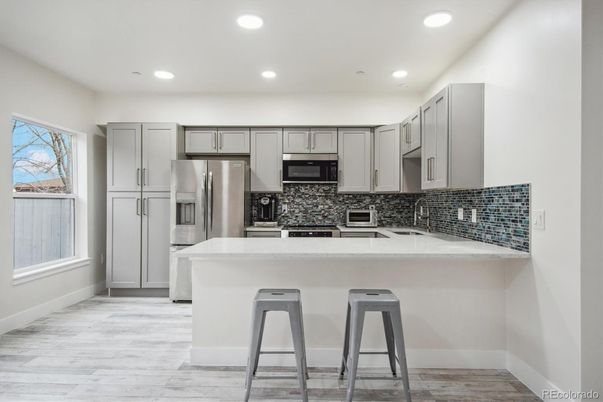 Interior, Kitchen, Recessed Lighting, Stainless Steel Appliances, Wood Texture Flooring