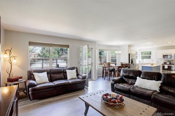 Chandelier, Dining room, Interior, Kitchen, Living room, Recessed Lighting, Stainless Steel Appliances, Wood Texture Flooring