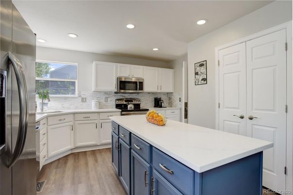 Interior, Kitchen, Recessed Lighting, Stainless Steel Appliances, Wood Texture Flooring