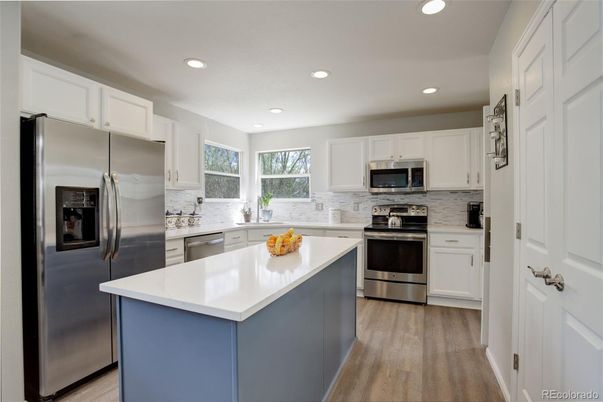 Interior, Kitchen, Recessed Lighting, Stainless Steel Appliances, Wood Texture Flooring