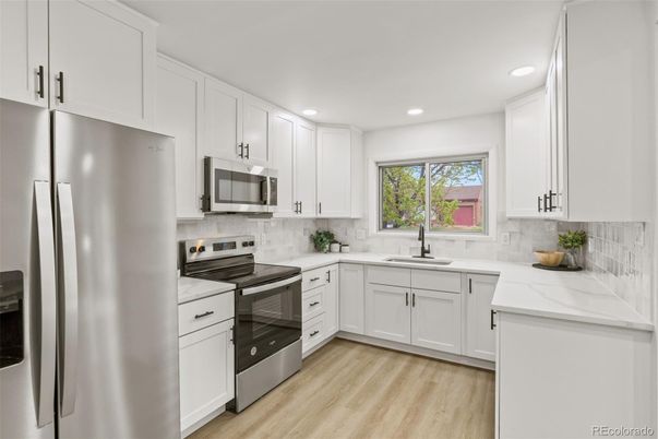 Interior, Kitchen, Recessed Lighting, Stainless Steel Appliances, Wood Texture Flooring