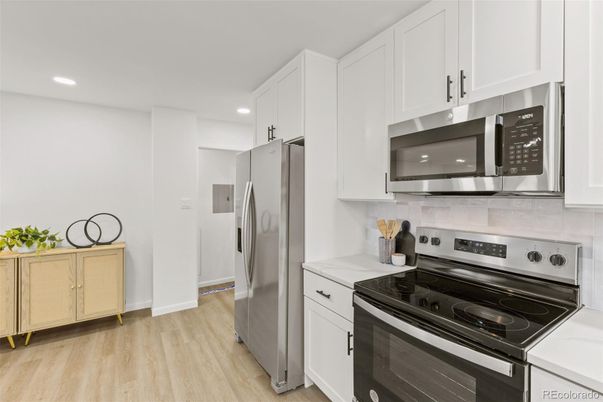 Interior, Kitchen, Recessed Lighting, Stainless Steel Appliances, Wood Texture Flooring