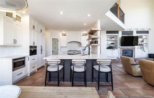 Fireplace, Interior, Kitchen, Recessed Lighting, Stainless Steel Appliances