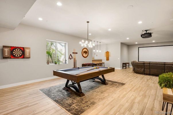 Billiard Table, Game Room, Interior, Pendant Lights, Projection Screen, Recessed Lighting, Wood Texture Flooring