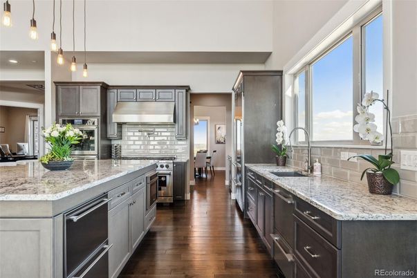 Dining room, Interior, Kitchen, Pendant Lights, Recessed Lighting, Stainless Steel Appliances, Wood Texture Flooring
